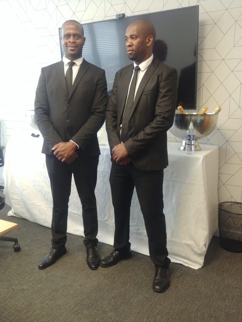Professional wait staff ready for fine-dining service